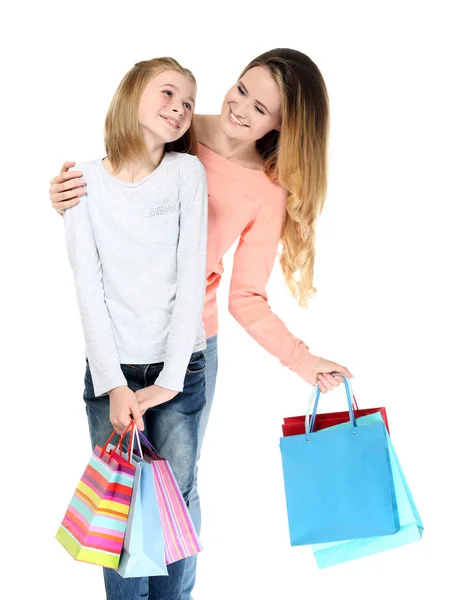 Mother and daughter with paper bags — Stock Photo, Image