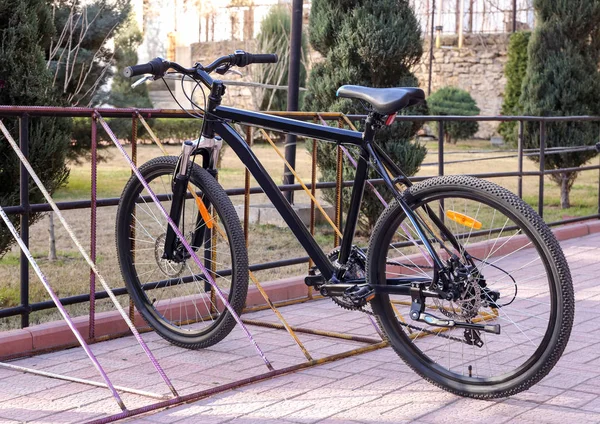 Bicycle in parking lot — Stock Photo, Image