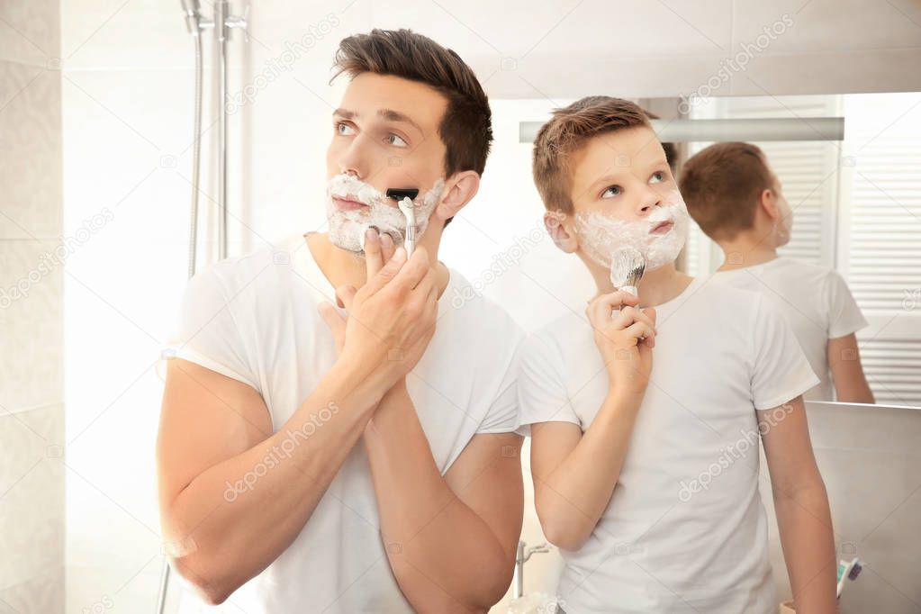 Father and son shaving 