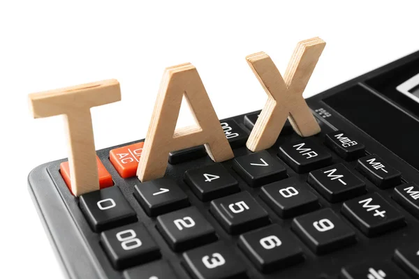 Word TAX e calcolatrice — Foto Stock