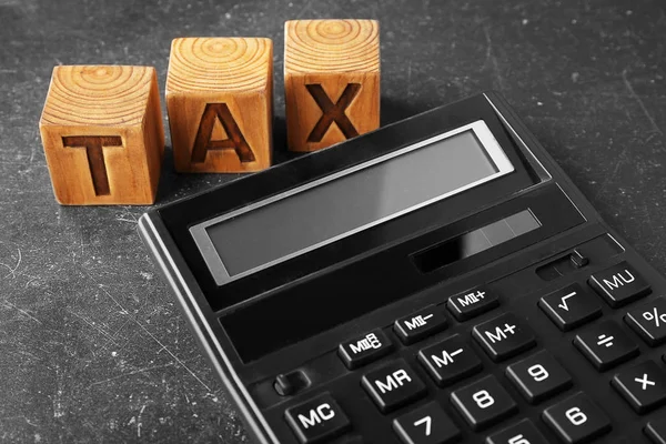 Word TAX and calculator — Stock Photo, Image