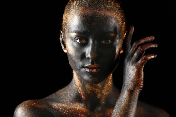 Woman with dark paint and sparkles on body — Stock Photo, Image