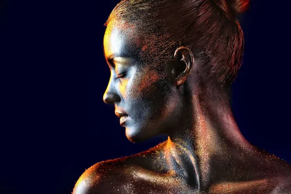 Woman with dark paint and sparkles on body — Stock Photo, Image