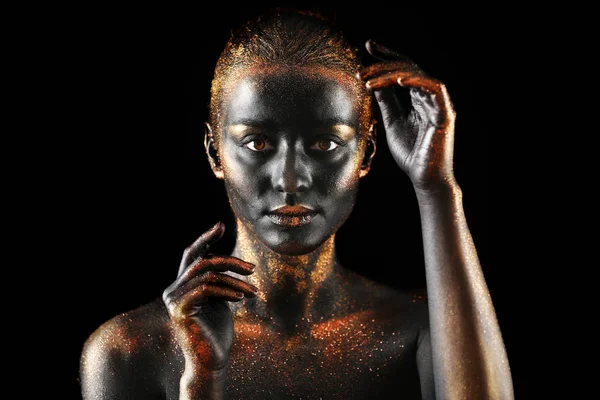 Woman with dark paint and sparkles on body — Stock Photo, Image