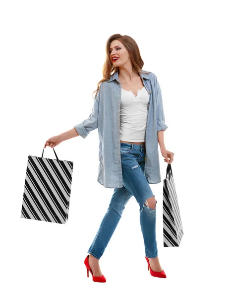 Young woman with paper bags — Stock Photo, Image