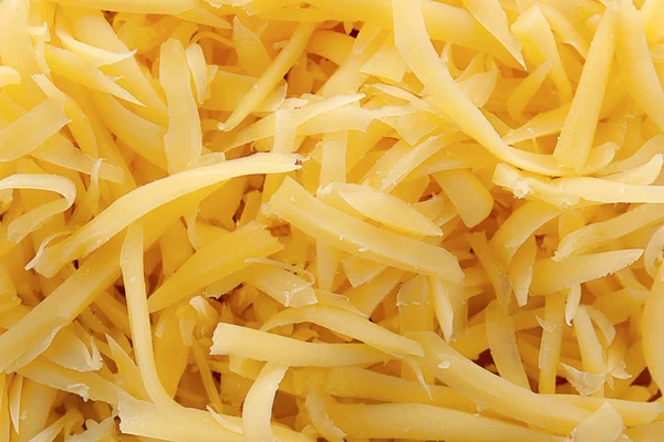 Textura de queso rallado —  Fotos de Stock