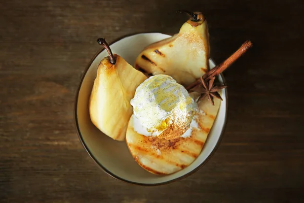 Bowl with pears and ice cream — Stock Photo, Image