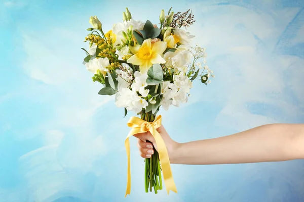 Woman holding bouquet with freesia flowers — Stock Photo, Image
