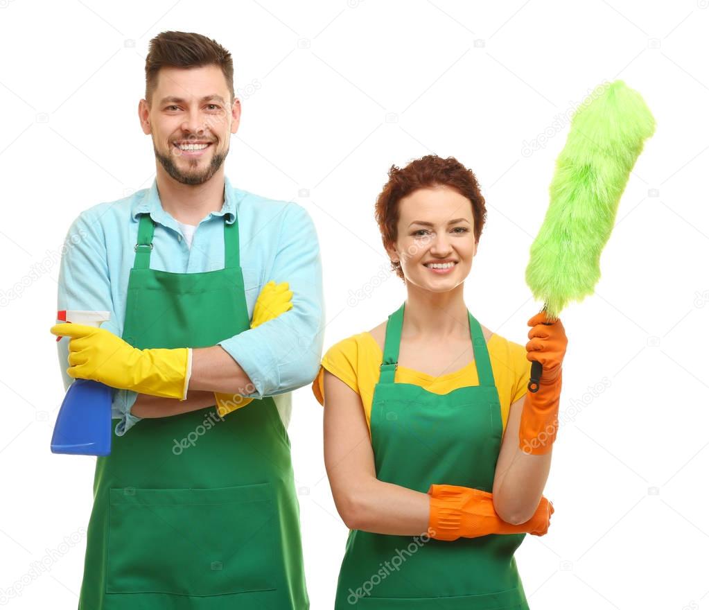 Couple with cleaning supplies  