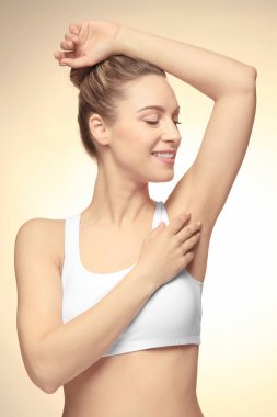 young woman with depilated armpit clipart