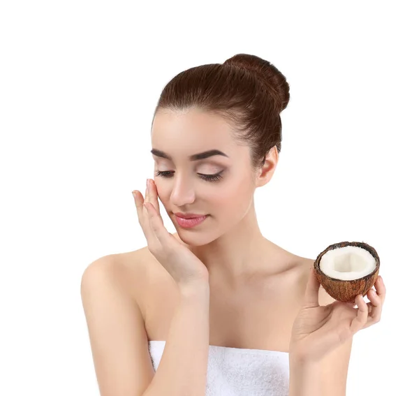 Woman applying coconut oil onto skin — Stock Photo, Image