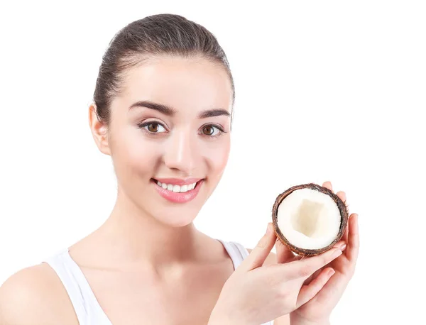 Young woman holding coconut — Stock Photo, Image