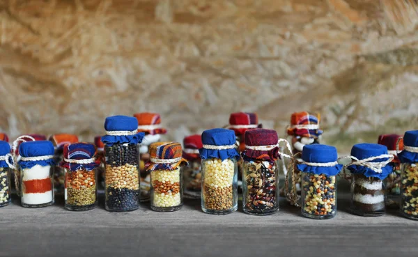 Beautiful jars with grains — Stock Photo, Image