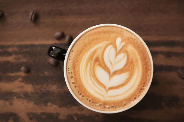 Xícara de café com arte latte — Fotografia de Stock