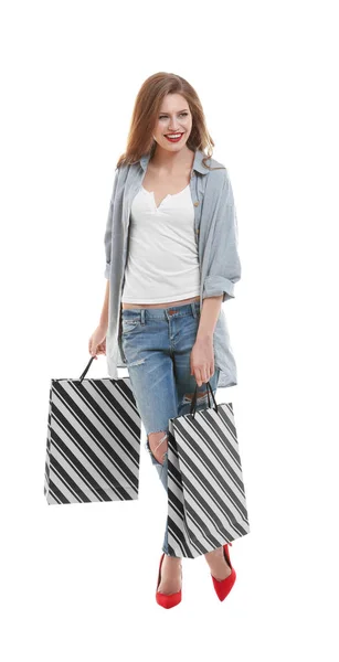 Young woman with paper bags — Stock Photo, Image