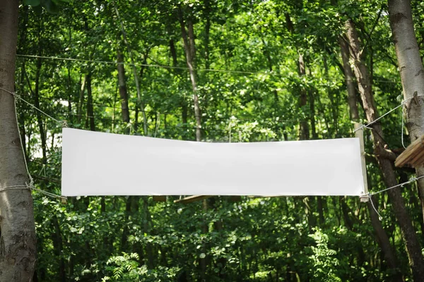 Long vinyl banner on natural background