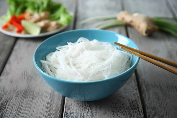 Plate of tasty rice noodles — Stock Photo, Image