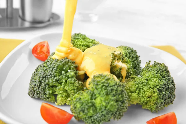 Broccoli and cheese sauce — Stock Photo, Image
