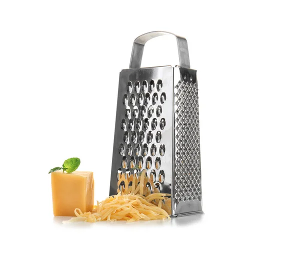 Metal grater and piece of cheese — Stock Photo, Image