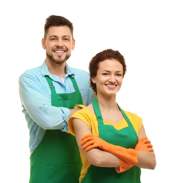 Couple in aprons and gloves — Stock Photo, Image