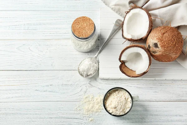 Composición con harina de coco sobre fondo de madera —  Fotos de Stock