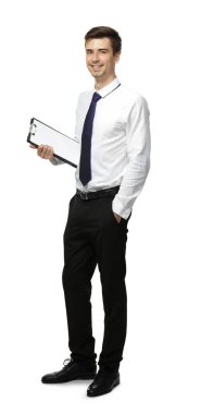Handsome young man with clipboard on white background clipart