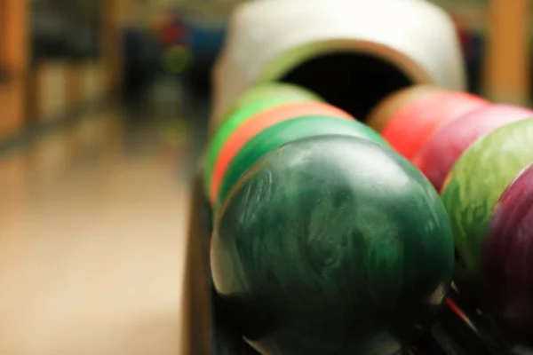 Colorful balls on rack — Stock Photo, Image