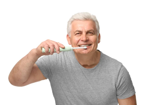 Starší muž, čištění zubů — Stock fotografie