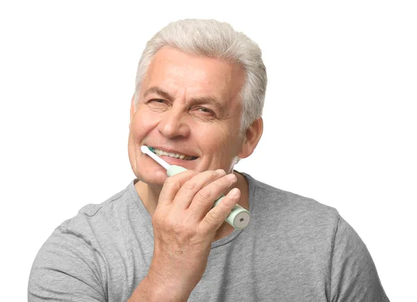 Senior man cleaning teeth — Stock Photo, Image