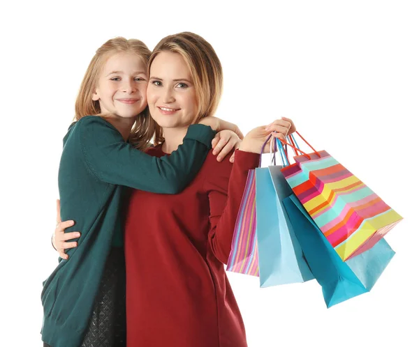 Mother and daughter with paper bags — Stock Photo, Image