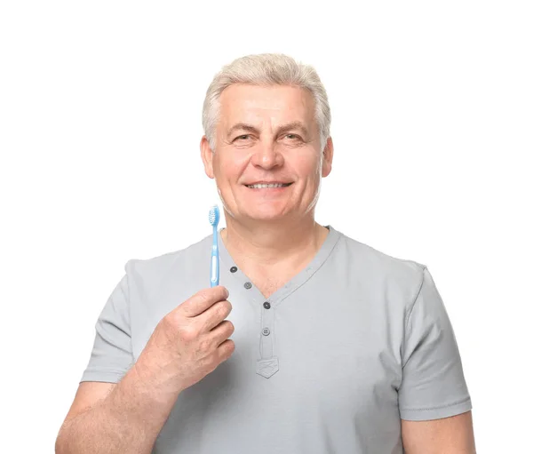 Hombre mayor con cepillo de dientes —  Fotos de Stock