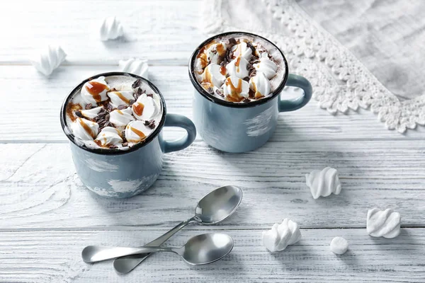 Cups of hot cocoa drink