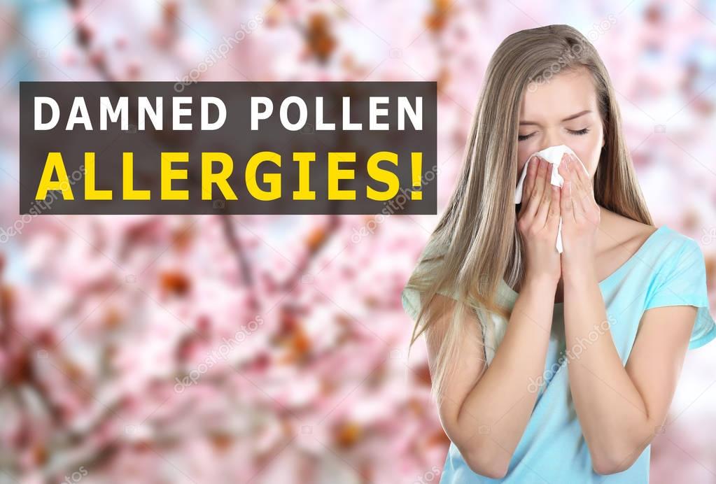 Young woman with tissue outdoor, Pollen allergy concept