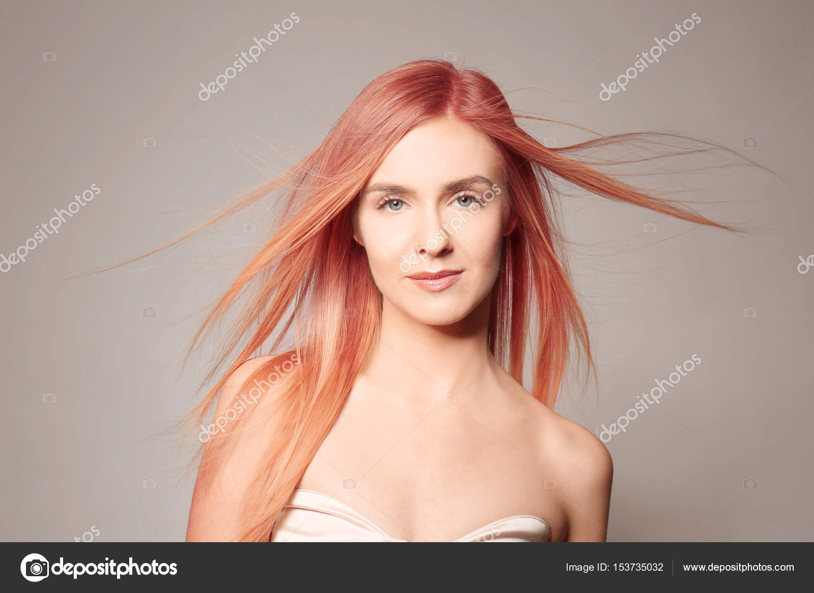Young Woman With Strawberry Blonde Hair On Color Background