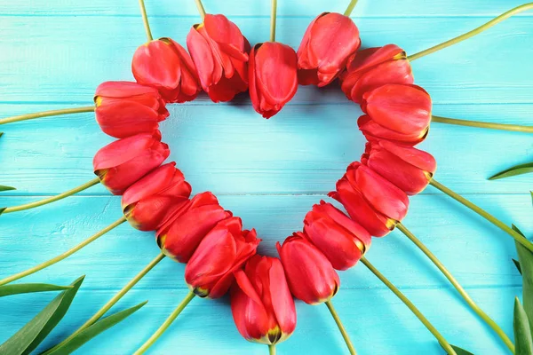 Marco hecho de hermosos tulipanes — Foto de Stock