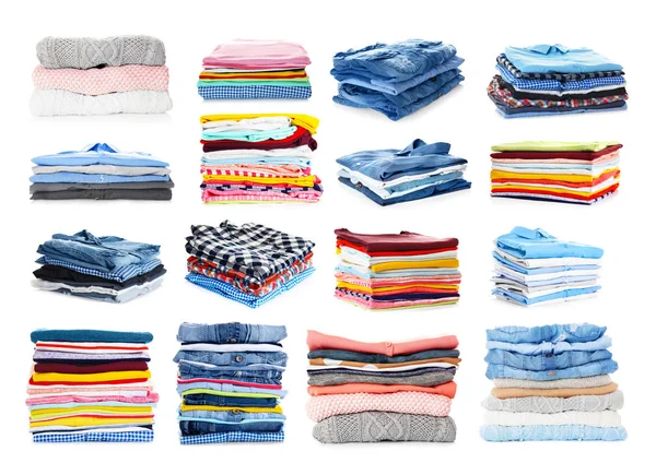 Stacks of folded clothes on white background — Stock Photo, Image