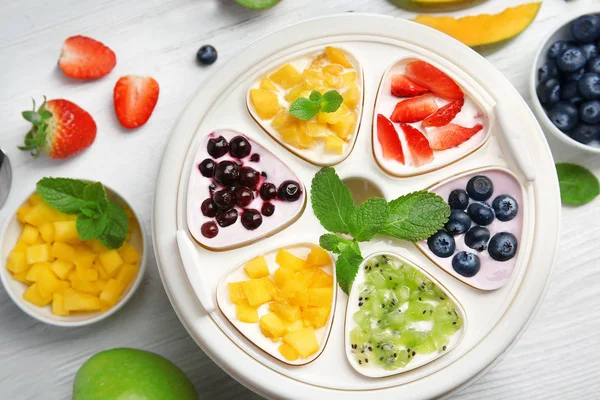 Automatic yogurt maker with fruits — Stock Photo, Image