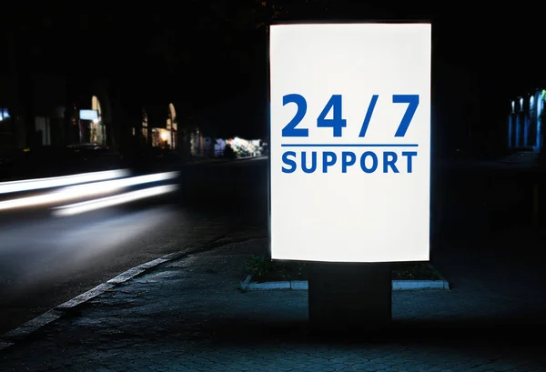 Skylt med text 24/7 Support på gatan — Stockfoto
