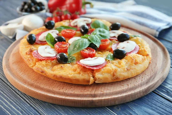 Delicious pizza and napkin — Stock Photo, Image