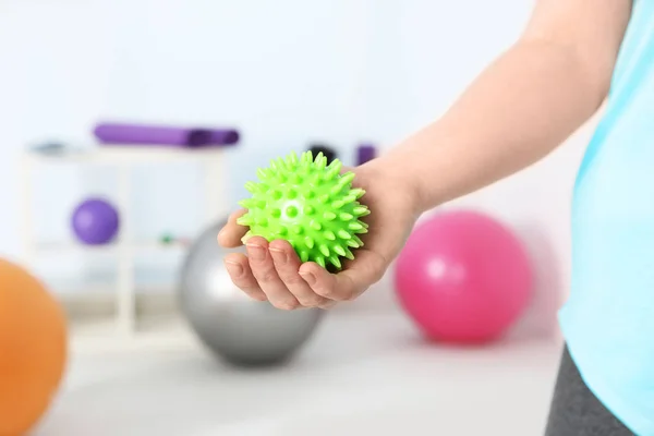 Woman with stress ball