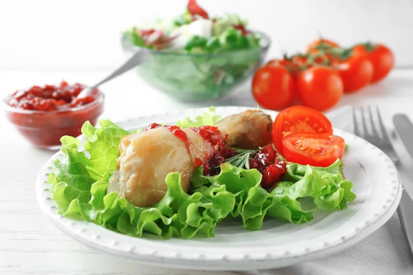 Portion of chicken and cranberry sauce — Stock Photo, Image