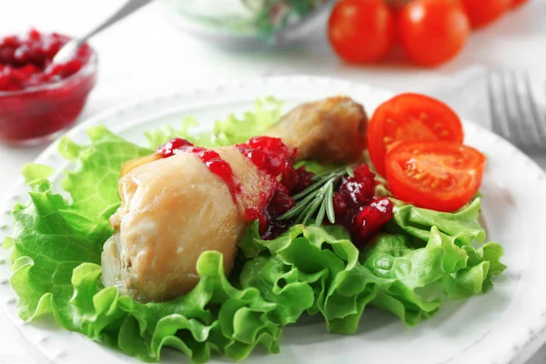 Portion of chicken and cranberry sauce — Stock Photo, Image