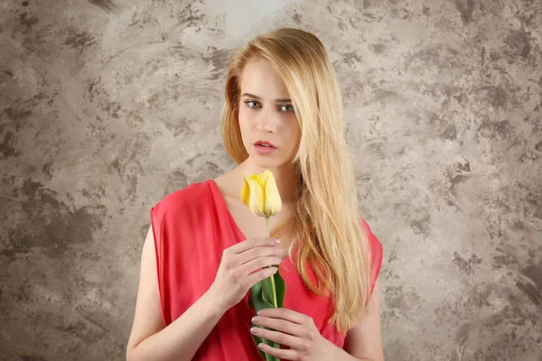 Young woman with tulip — Stock Photo, Image