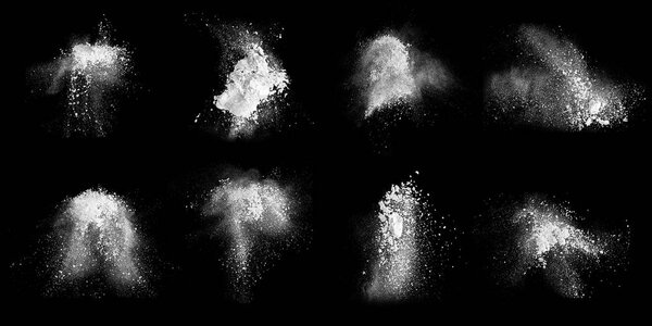 Clouds of flour on black
