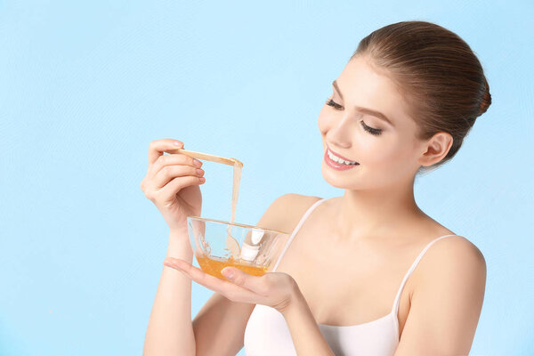 young woman with sugaring paste
