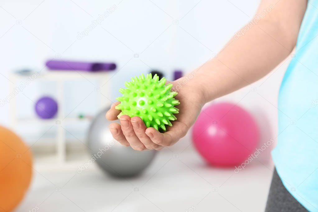 Woman with stress ball 