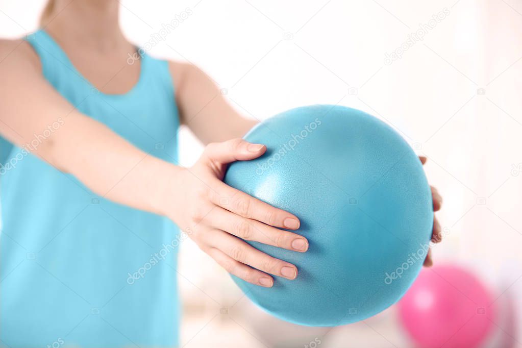 Woman with rubber ball 