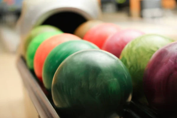 Colorful balls on rack — Stock Photo, Image