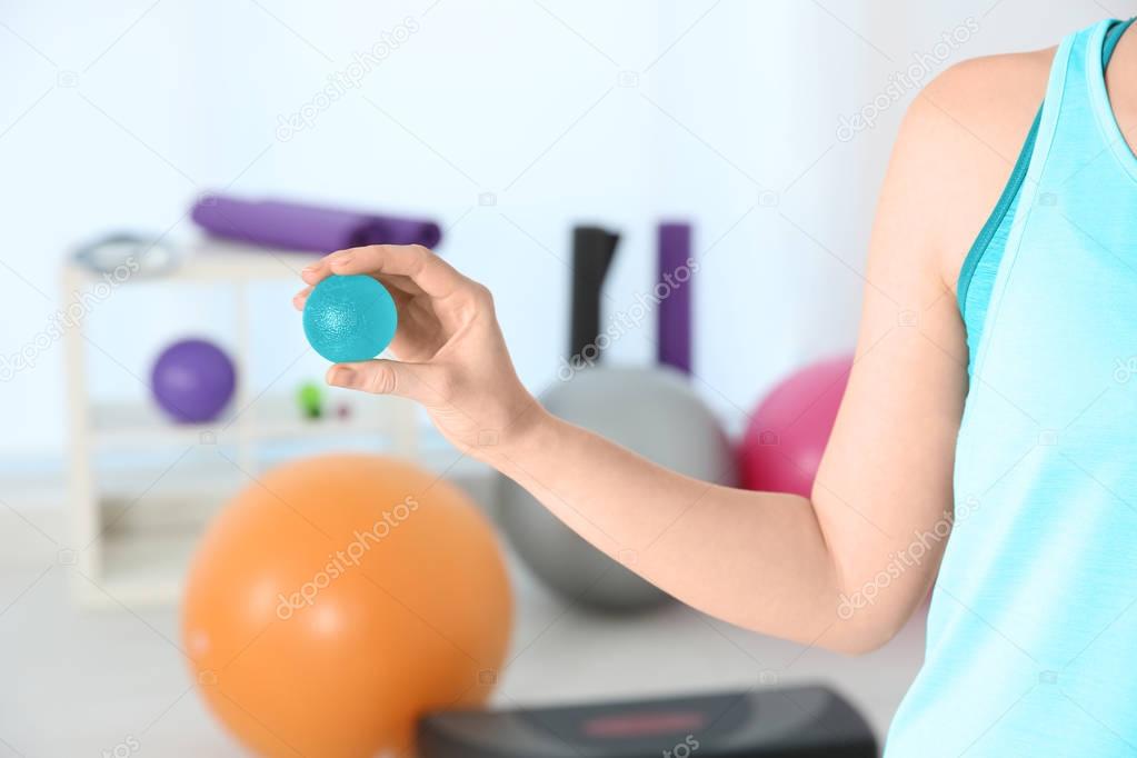 Woman with stress ball 