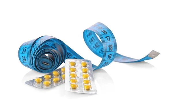 Измерение ленты и пузырьков упаковки таблеток — стоковое фото